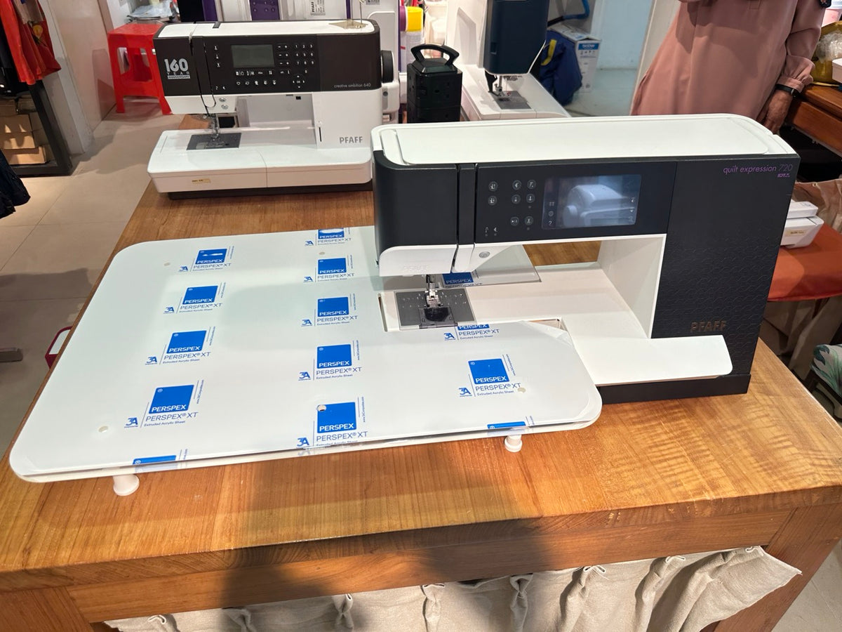 PFAFF Quilt Expression™ 720 Huge Throat Space setup with the Quilt Table.
